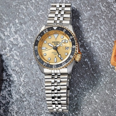 Seiko 5 Sports GMT Automatic 70th Anniversary Taiwan Limited Edition Gold Dial Silver Steel Strap Watch For Men - SSK044K1
