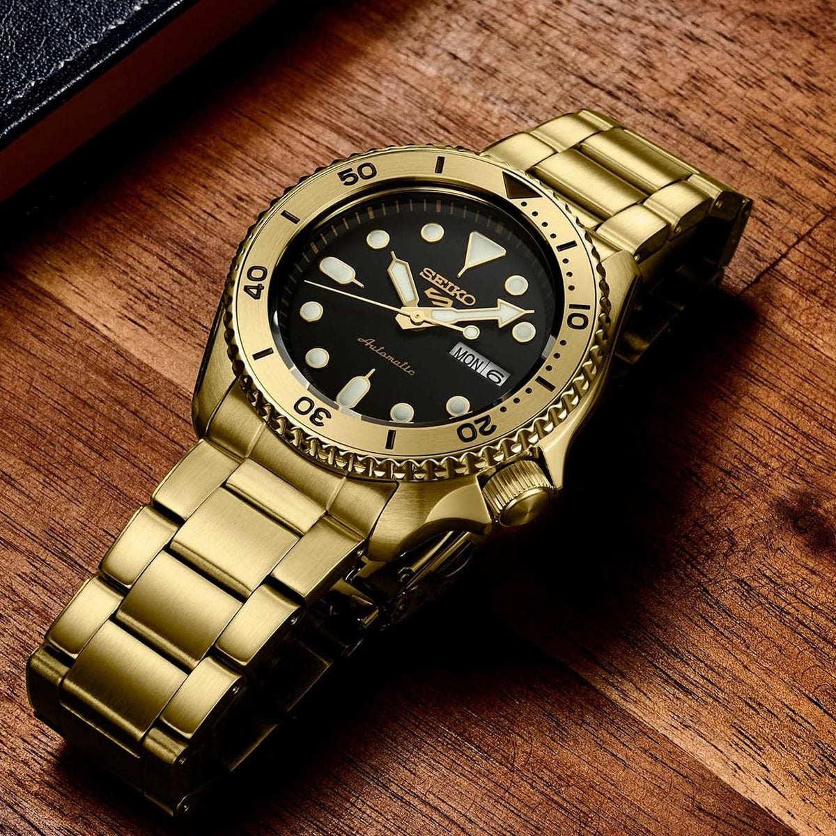 Seiko 5 Sports Automatic Black Dial Gold Steel Strap Watch For Men - SRPK18